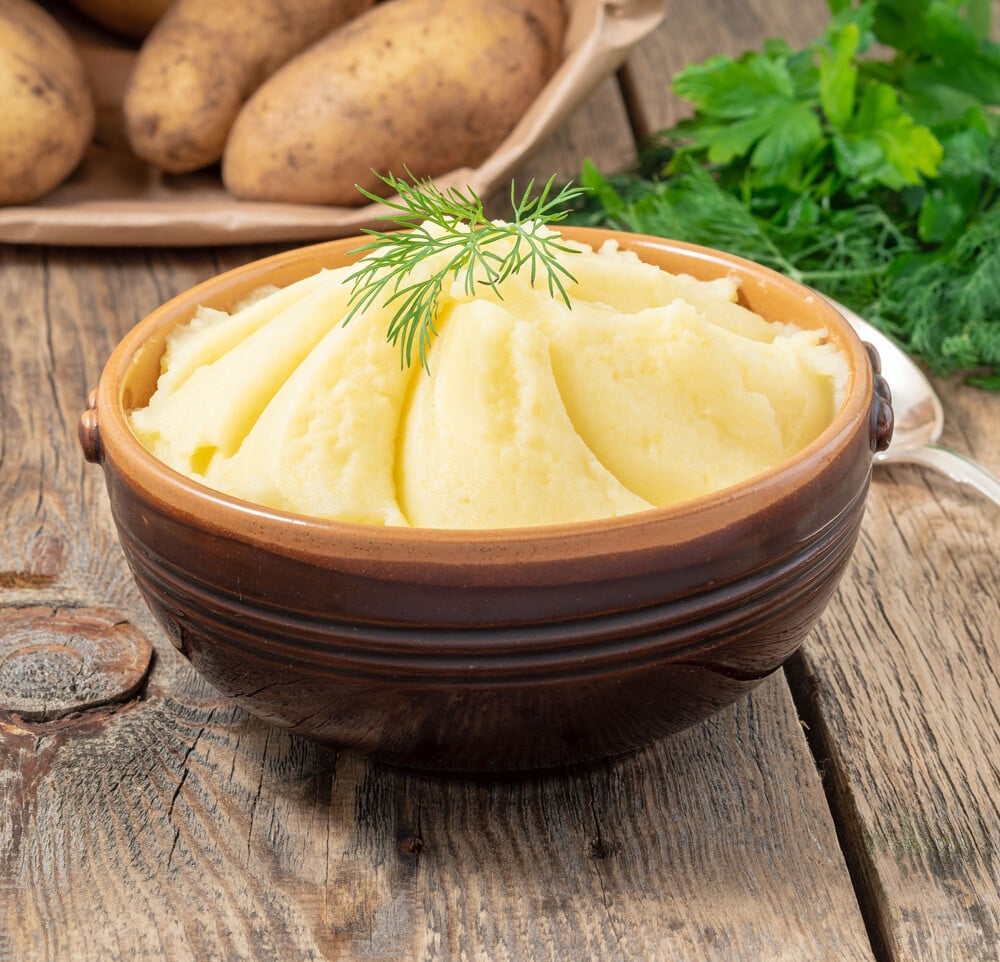 mashed-potatoes-boiled-puree-in-brown-bowl-on-dar-2023-11-27-05-26-25-utc